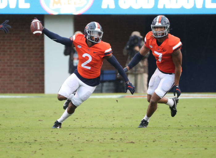 Virginia safety De'Vante Cross celebrates an interception against Duke.